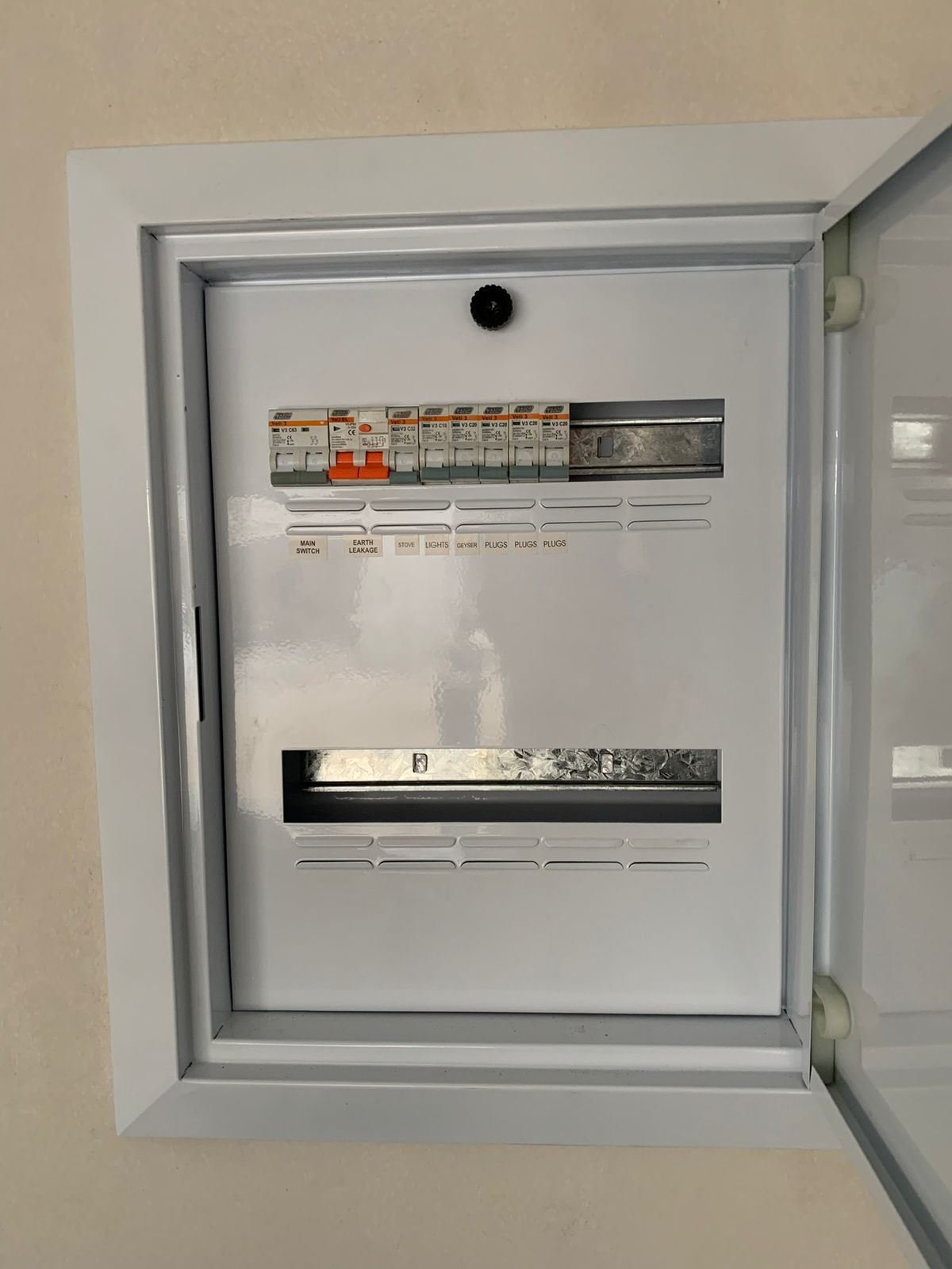Finished distribution board enclosure with labeled circuits